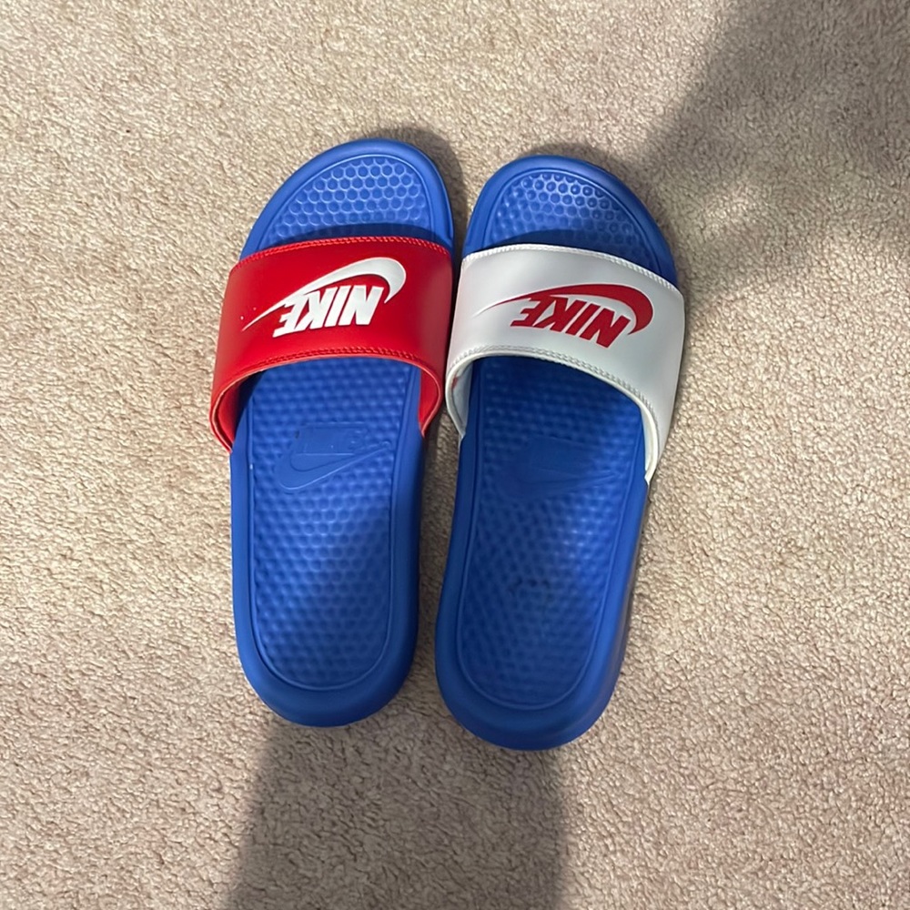 Red, white and blue Nike Slides
